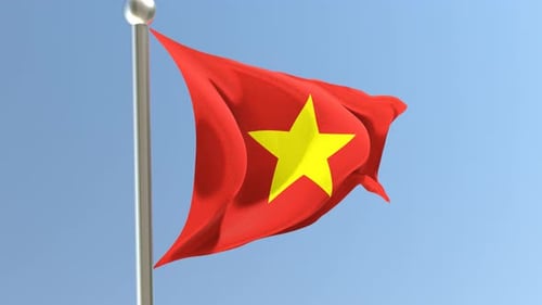 Waving Flag of Vietnam Against a Clear Blue Sky