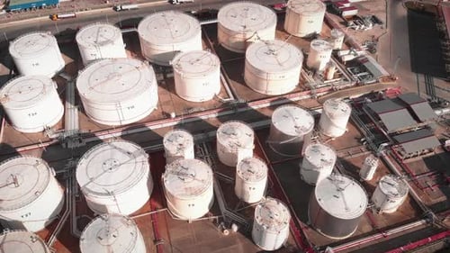 Aerial View of Industrial White Storage Tanks