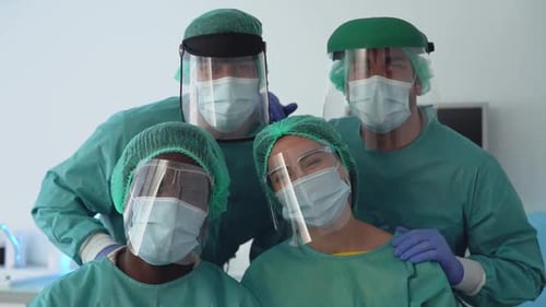 Medical Team in Scrubs, Masks, and Face Shields