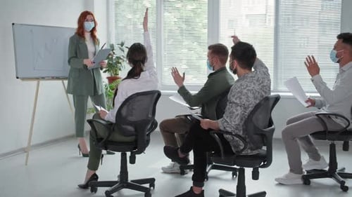 Business Team Meeting in Modern Office Wearing Masks