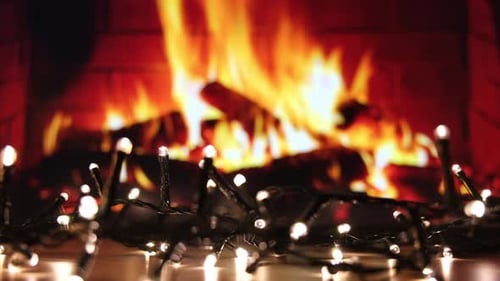 Glowing Fireplace and Fairy Lights at Night