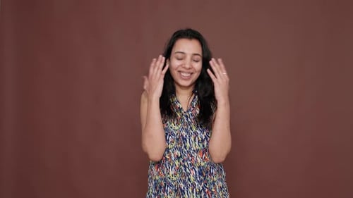 Portrait of Indian Model Feeling Excited and Positive About News