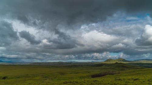 Clouds Move Over the Mountains and Plain in Iceland