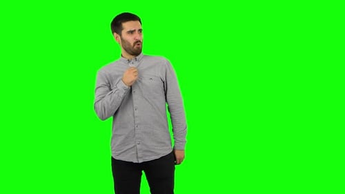 Brunette Guy Is Cooling Herself By Her Hand, Suffering From High Temperature Weather. Green Screen