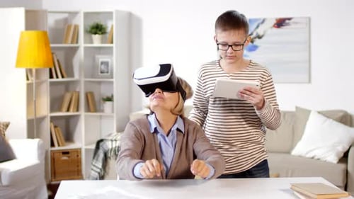 Senior Woman Experiences VR with Teenage Grandson