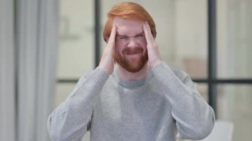 Young Beard Redhead Man Having Headache