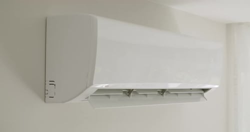 Modern White Air Conditioner Unit on Wall
