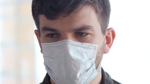 Young Adult Man Wearing Protective Face Mask