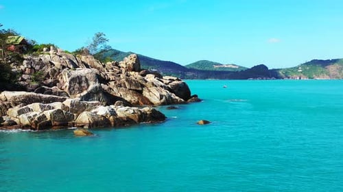Tropical fly over copy space shot of a summer white paradise sand beach and aqua blue water backgrou