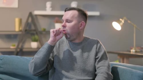 Portrait of Sick Casual Man Coughing