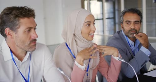 Panel Discussion with Woman Speaking at Conference
