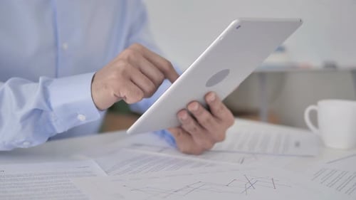 Businessman Using Tablet
