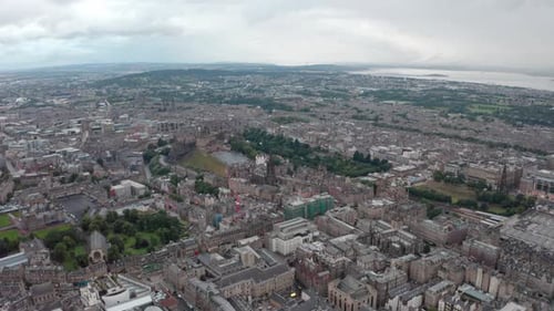 Dolly forward drone shot towards Edinburgh castle from the south