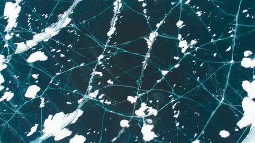 Top View of a Frozen Lake or River. Snow and Ice Form an Interesting Texture and Landscape.
