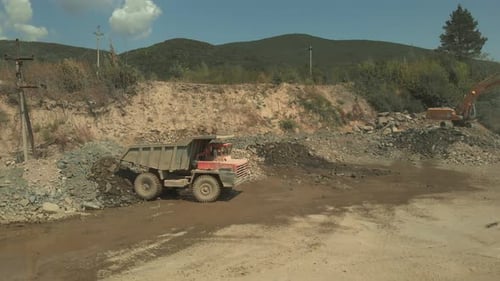 Large Dump Truck Parked in Rural Environment