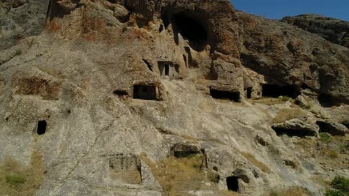 Ancient Carved Caves in a Stone Mountain