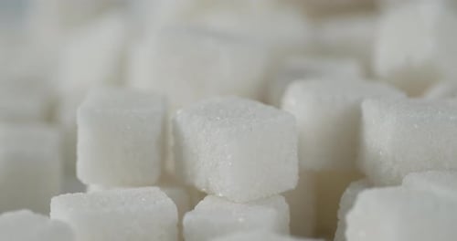 A Bunch of Sugar Cubes Rotate Slowly