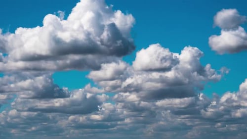 Cumulus Cirrus Clouds Move in the Blue Sky. Time Lapse.