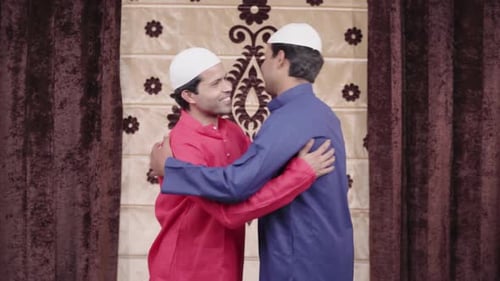 Muslim men wishing Happy Eid