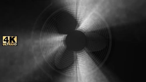Dark Industrial Fan Rotating with Atmospheric Smoke and Light