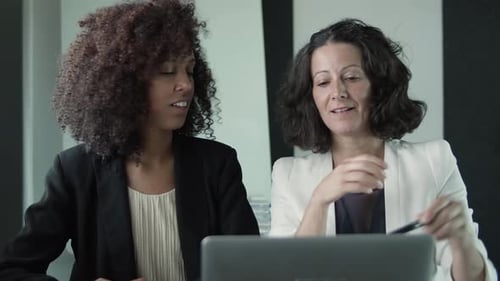 Business Meeting With Laptop in Modern Office