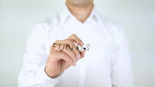 Writing the Word Funds on Clear Surface