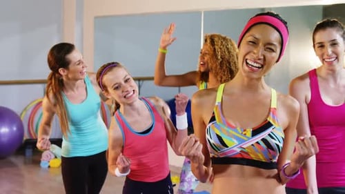 Happy Women Celebrate Fitness Class Success