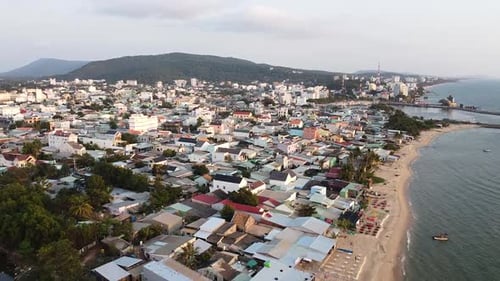 Aerial View of a Small Resort Town with Residential Buildings and Hotels with a Swimming Pool and