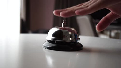 Hands of Man to Ring a Service Bell Continuously Rush and Urgency Case