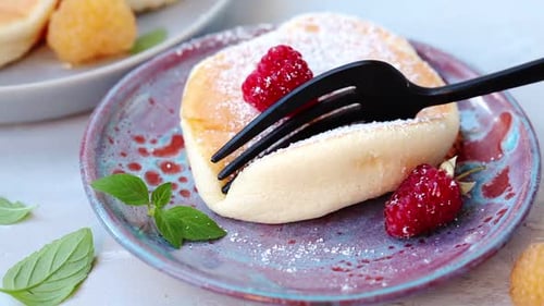 Fluffy Souffle Pancake Cut With Fork Close Up