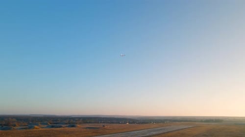 Small private aircraft airplane flying in the sky over the airfield