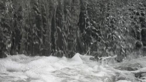 Clear Water Cascading in Small Waterfall