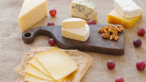 Delicious Cheese Board Still Life with Grapes