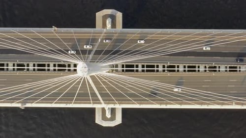 Aerial Top View of Cable-stayed Bridge with Cars