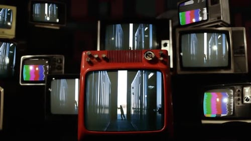 Man Opening Door at Warehouse on Retro TVs.