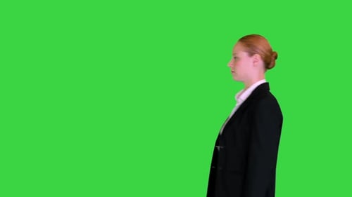 Walking By Businesswoman in Formal Outfit on a Green Screen Chroma Key