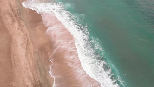Empty sea coastline with blue sea waves during epidemic of coronavirus Covid-19 pandemic.