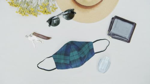 Top down view of manly personal items, coronavirus era essentials flat lay, concept of items a perso