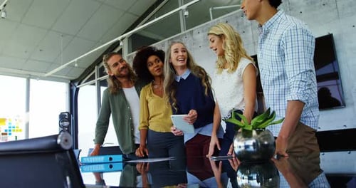 Diverse Colleagues Collaborating in Modern Office Setting