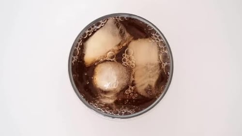 Refreshing Soda Beverage Poured Over Ice
