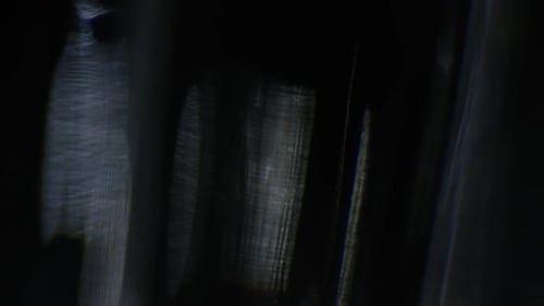 Shimmering Light Leak Effect on Dark Background