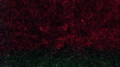 Sparkling Red and Green Glitter Particles Festive Background