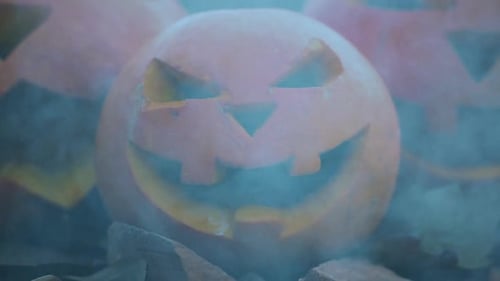 Jack O' Lanterns Glowing in Fog