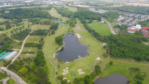 Aerial view of Golf Course Club and hotel resort. Green natural garden park in sport and recreation