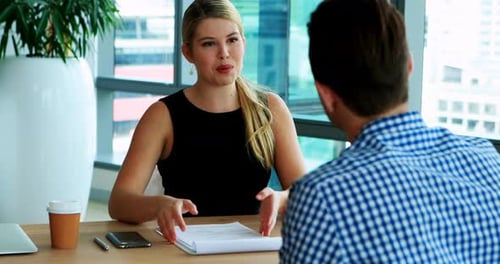 Professional Meeting in Modern Office Setting