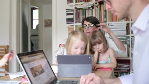Family Using Technology Together at Home