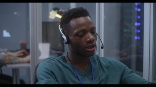Young Man Working in Data Center