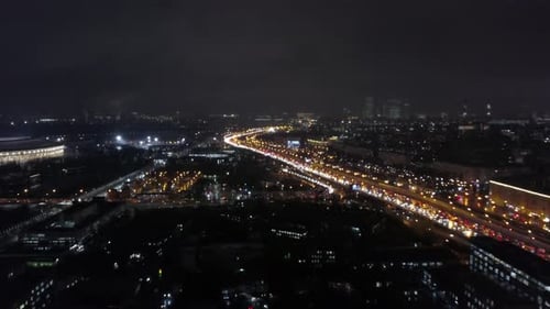 A beautiful aerial view of a night city sparkling with streetlights