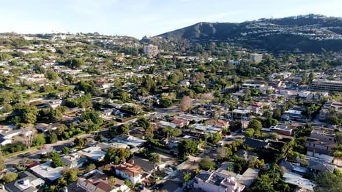Aerial View of La Jolla Little Coastline City with Wealthy Villas and Swimming Pool.