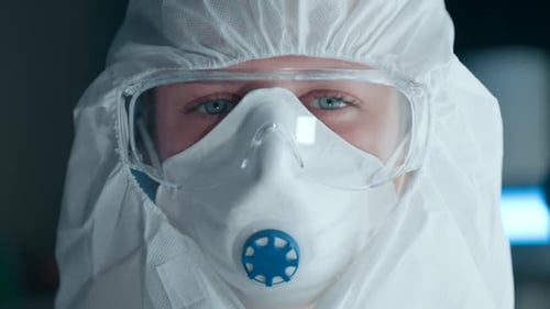 Medical Worker Protected by Gear in a Lab Setting